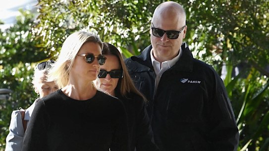 NSW Police Inspector Amy Scott (centre), arriving on Tuesday at the NSW Coroner’s Court in Lidcombe for the inquest into the Bondi mass stabbing.