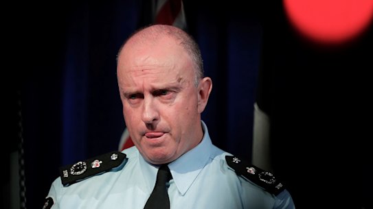 Acting Australian Federal Police commissioner Neil Gaughan fields questions over the raids. 