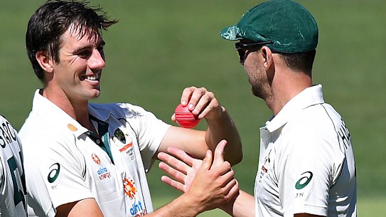 Josh Hazlewood, right, and Pat Cummins, left, had a day to remember in Adelaide. 