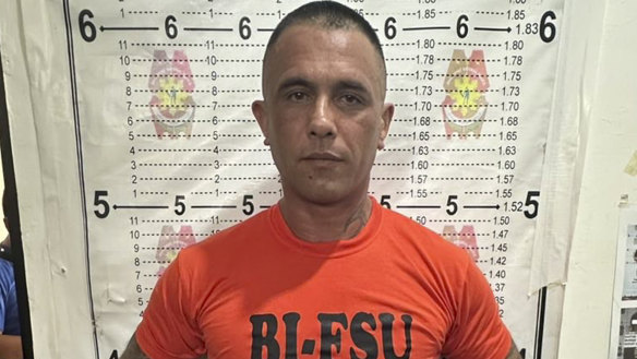 Gregor Johann Haas poses for a mugshot following his arrest in Cebu province.