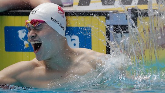 China's Sun Yang celebrates after winning the 200m freestyle by default.