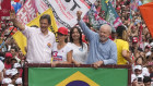 Former president Luiz Inacio Lula da Silva, right, and Sao Paulo gubernatorial candidate Fernando Haddad, left, greet supporters during a campaign rally in Sao Paulo at the weekend.