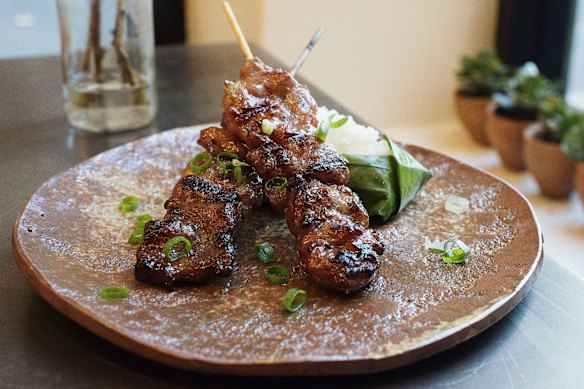 Moo ping pork skewers.