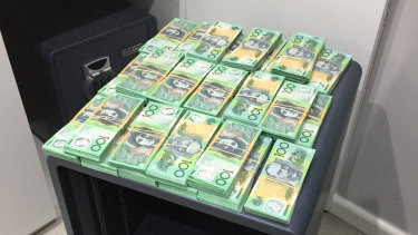 Cash seized during raids on Assure Protection Services, a Sydney security business that allegedly acted as a front to launder $100 million from organised crime groups.