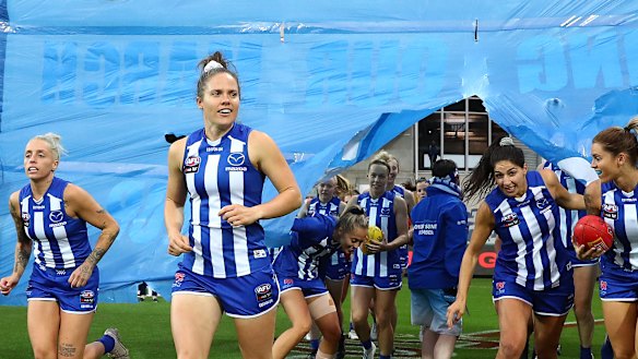Hopping to it: Emma Kearney leads the Kangaroos out during the 2020 AFLW season.
