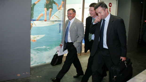 Taking it in their stride: Warriors' director of football John Hart, chairman Maurice Kidd and chief executive Wayne Scurrah leave NRL HQ after being fined fined for salary cap breaches.