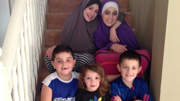 Hoda Sharrouf (right) has begged to be allowed back into Australia. She is pictured with sister Zaynab before leaving the country. 