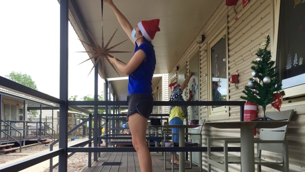 Travellers decorating quarantine balconies in the Northern Territory. 