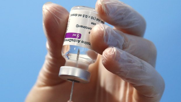 A health worker prepares a dose of the AstraZeneca vaccine.