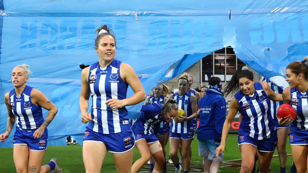 Hopping to it: Emma Kearney leads the Kangaroos out during the 2020 AFLW season.