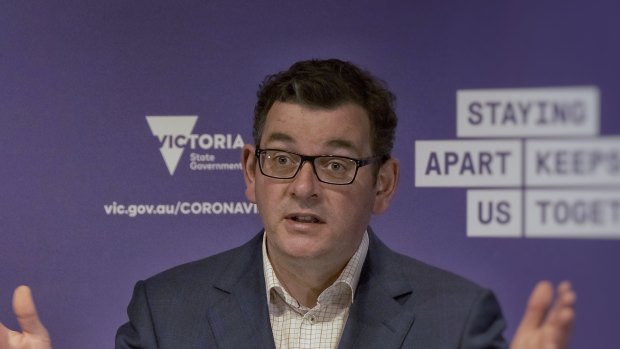 Still a long way to go: Premier Daniel Andrews outlines the road map on Sunday.
