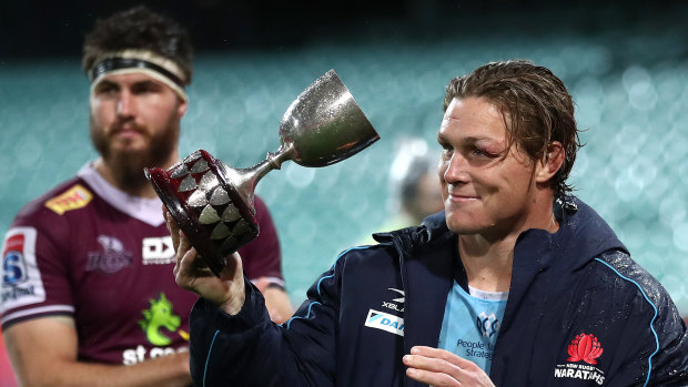 Michael Hooper of the Waratahs receives a trophy during the round six Super Rugby AU match between the Waratahs and the Reds at Sydney Cricket Ground on August 08, 2020 in Sydney, Australia.