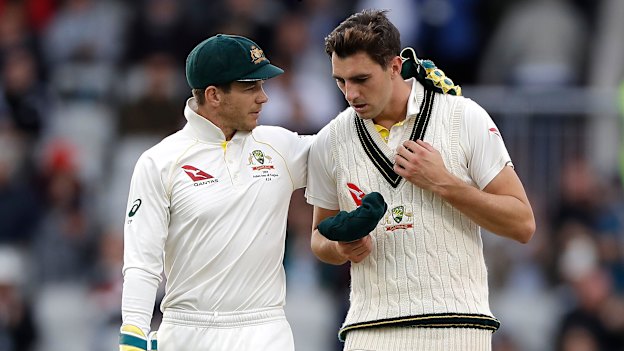 With Tim Paine, whom Cummins replaced as captain.