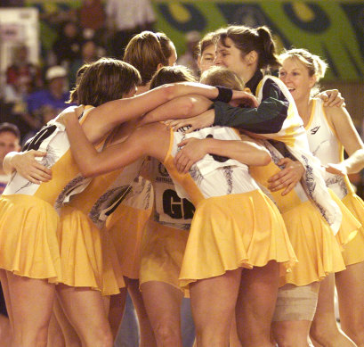 The Australian team celebrating their win at the 1998 Kuala Lumpur Commonwealth Games netball finals.