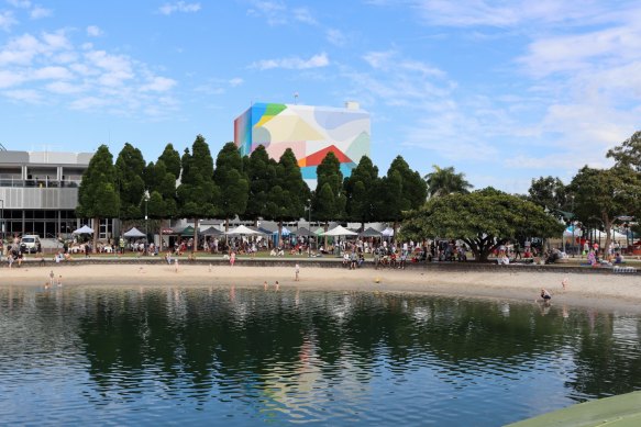 The markets at Home of the Arts in Surfers Paradise are next to Evandale Lake.