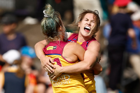 Shannon Campbell (right) celebrates the Brisbane Lions’ win over Adelaide.
