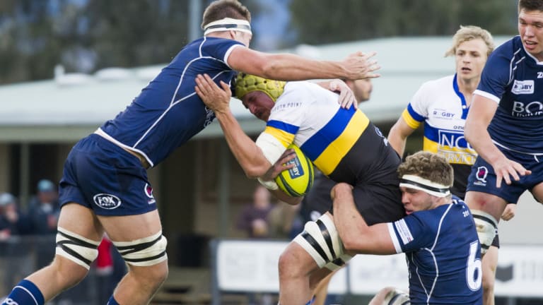 Vikings' Ben Hyne takes on the Queensland defence.