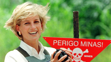 Diana, Princess of Wales holds landmine during visit to Haumbo minefields in Angola on behalf of the Red Cross.