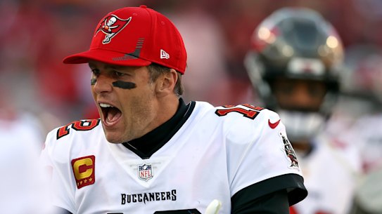 ampa Bay Buccaneers quarterback Tom Brady (12) tries to fire up the team during the second half of an NFL divisional round playoff football game against the Los Angeles Rams Sunday, Jan. 23, 2022, in Tampa, Fla. (AP Photo/Mark LoMoglio)