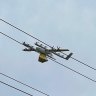 Drone flies into powerlines and catches fire, leaving thousands without power