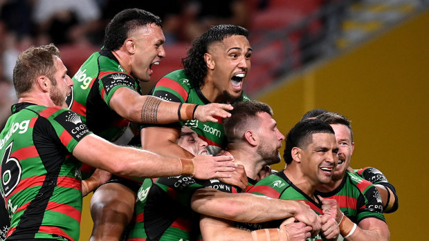 The Rabbitohs celebrate a try in their impressive victory over Manly to reach Sunday’s grand final.