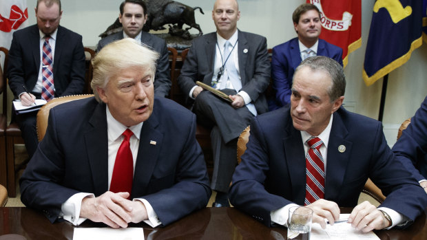 Republican Congressman Chris Collins (right) pictured with Donald Trump. 