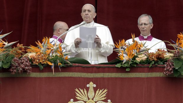 Close to the Christians of Sri Lanka: Pope Francis delivers his "Urbi et Orbi" ("to the city and the world") message in St Peter's Square at the Vatican. 