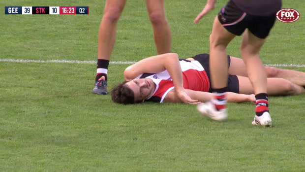Dylan Roberton collapses on the field in April last year.