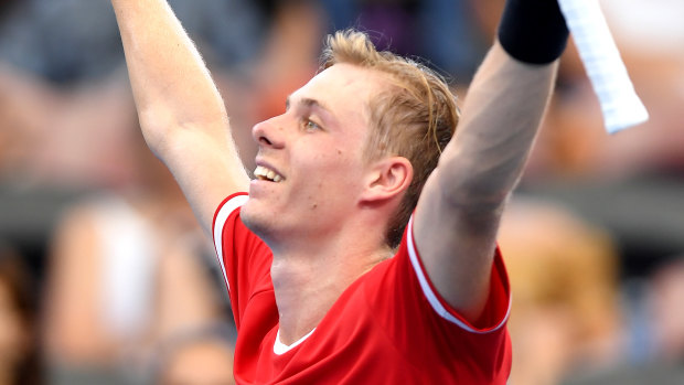 Denis Shapovalov of Canada celebrates victory in his match against Stefanos Tsitsipas of Greece.