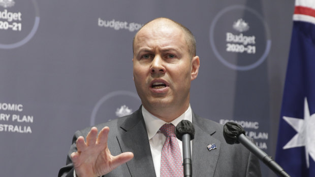 Treasurer Josh Frydenberg addresses the media at his budget press conference in Canberra.