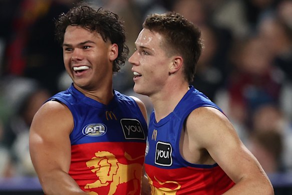 Cam Rayner, Logan Morris and their Lions teammates were all smiles.