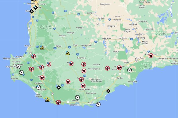 Around 30 schools and six national parks have been closed as emergency crews brace for hot and windy conditions in the state’s southern region. 