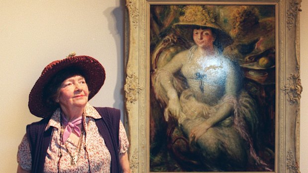 Margaret Olley with a painting of herself by William Dobell.