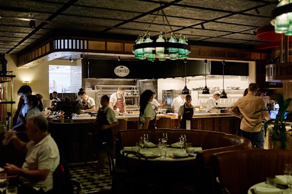 The restaurant's focal point is its open kitchen and parrilla grill.