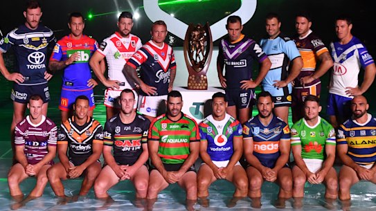 The captains from the sixteen NRL teams line up for a photograph 