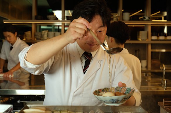 Two broths are available: a clear duck-based soup; and a 12-hour chicken option. 