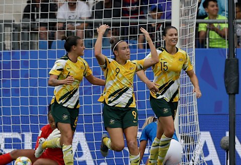 Caitlin Foord celebrates scoring Australia's  first goal against Brazil.