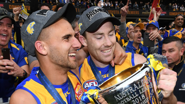 Dom Sheed (L) and McGovern celebrate their premiership. 