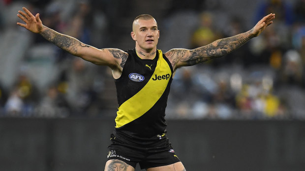 Pivotal: Dustin Martin is a force to be reckoned with, opening up the game and penetrating deep forward.