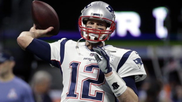 New England Patriots quarterback Tom Brady warms up before the game.