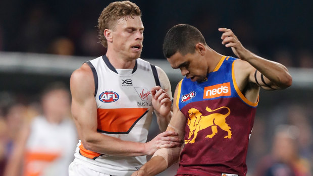 Cruel blow: Giants' Adam Kennedy makes contact with Charlie Cameron's injured elbow.