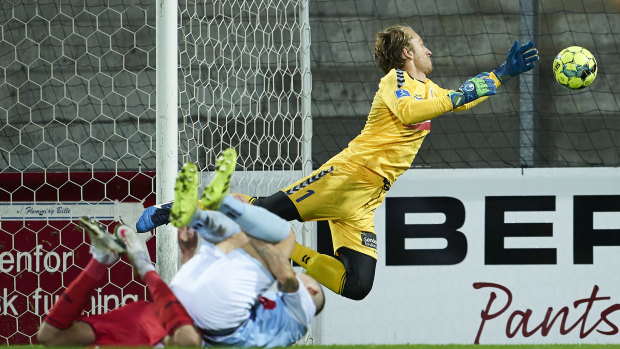 Lawrence Thomas saves for Sonderjyske against AGF Aarhus. 