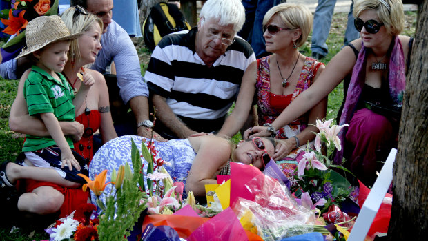 Family and friends gather around Bianca Girven's mother Sonia Anderson in 2010. 