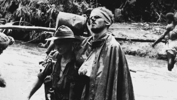 A Damien Parer image that has become iconic of the New Guinea campaign during World War II.