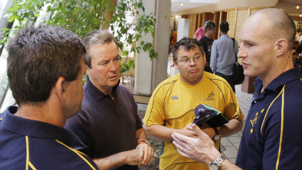 John O'Neill, second from left, and Peter McGrath, second from right, worked together as chief executive and chairman. 