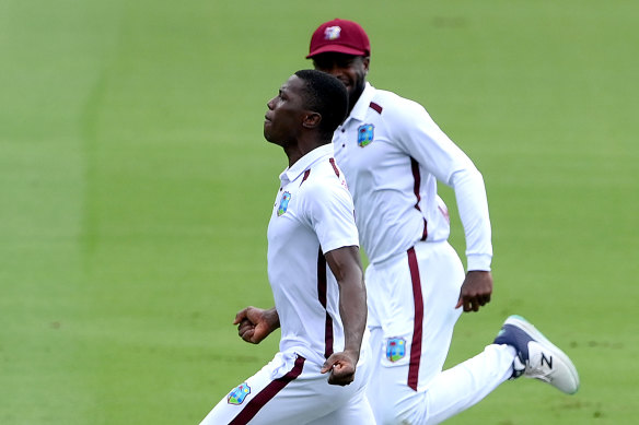 Shamar Joseph celebrates the wicket of Australian captain Pat Cummins.