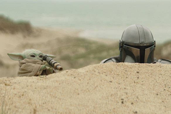 Grogu and Din Djarin (Pedro Pascal) in The Mandalorian and Grogu.