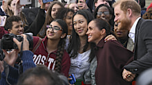 Prince Harry and Meghan drew large crowds when they made their public return to the spotlight in Nottingham on Thursday.
