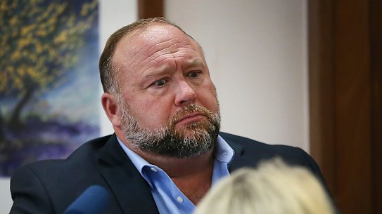 Conspiracy theorist Alex Jones attempts to answer questions about his emails asked by lawyer Mark Bankston, representing the victims of the 2012 Sandy Hook school shooting.