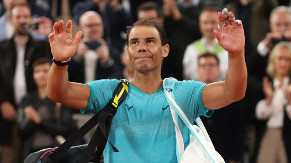 PARIS, FRANCE - MAY 27: Rafael Nadal of Spain waves to the crowd as he walks off after his defeat by Alexander Zverev of Germany in the Men’s Singles first round match on Day Two of the 2024 French Open at Roland Garros on May 27, 2024 in Paris, France. (Photo by Clive Brunskill/Getty Images)